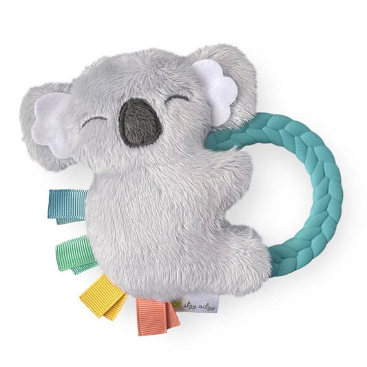 a stuffed koala toy with a blue ring around it's neck