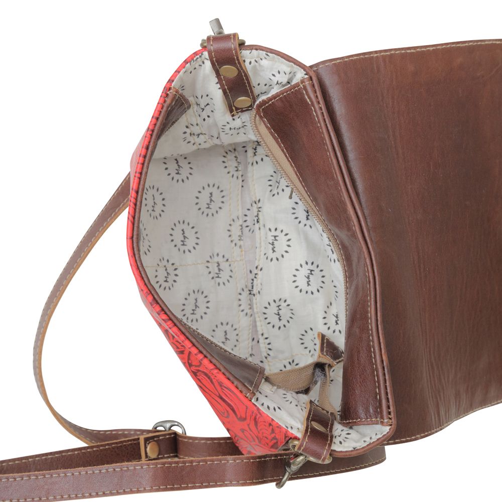 a brown and red purse with a strap