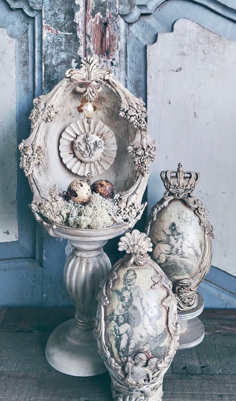 a group of vases sitting on top of a wooden floor