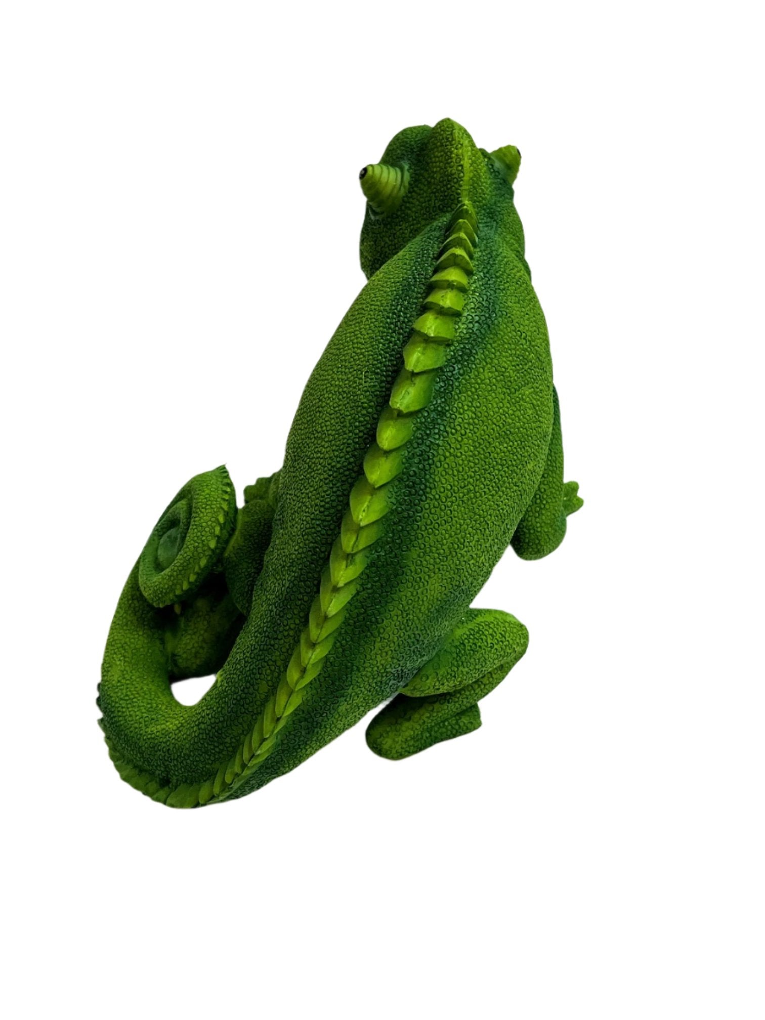 a green lizard made of grass on a white background