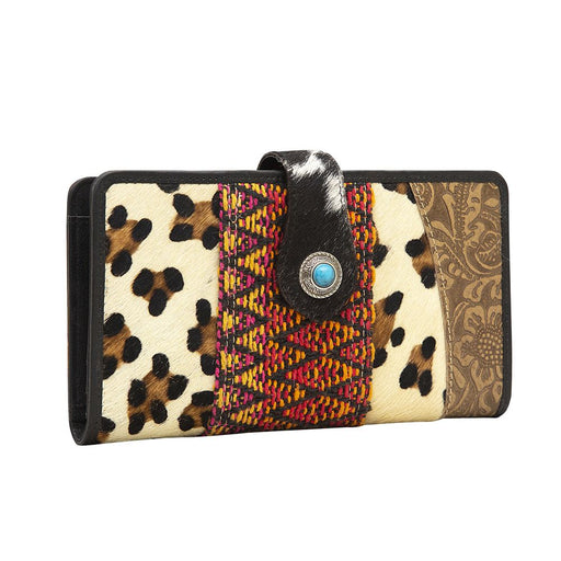 an animal print wallet with a button on the front