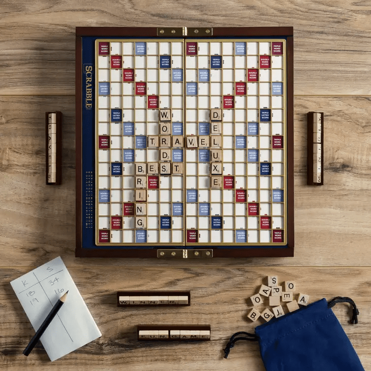 a scrabble board with a crossword puzzle on it