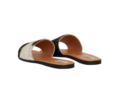 a pair of black and white sandals