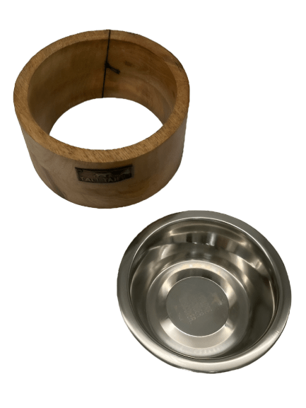 a wooden bowl and a metal bowl on a white background