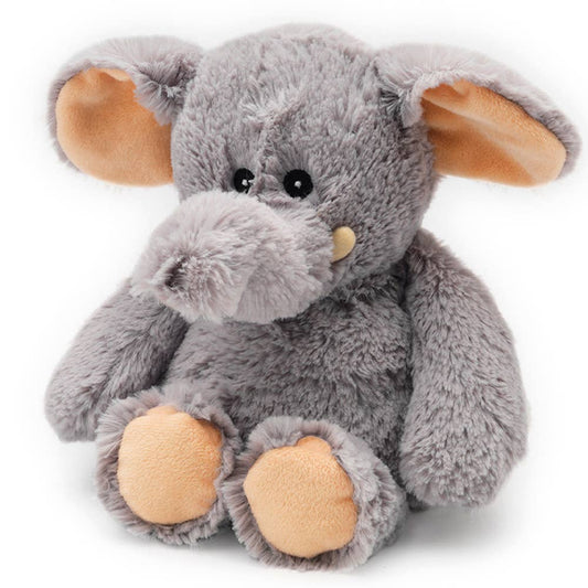 a gray stuffed elephant sitting up against a white background