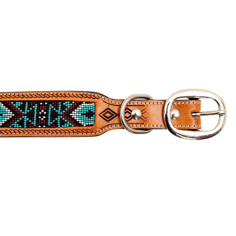 a leather dog collar with a beaded design on it