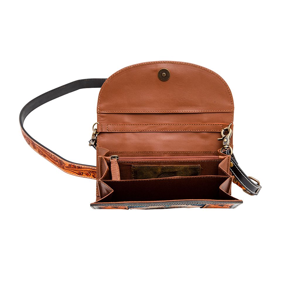 a brown leather purse with a strap