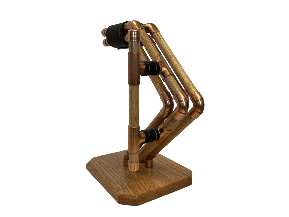 a headphone stand made out of copper pipes and wood