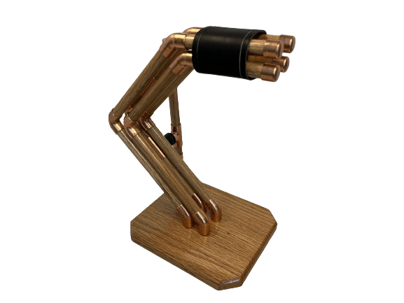 a headphone stand made out of copper pipes and wood