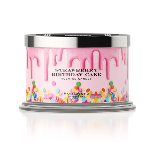 a 4-wick candle in a jar with lid on it with a pink birthday cake design on it