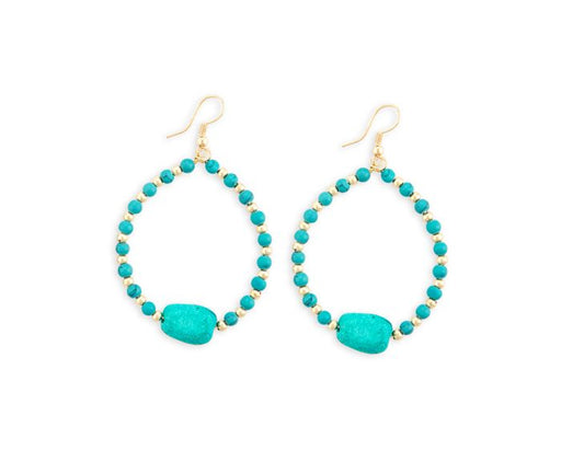 a pair of turquoise beaded hoop earrings