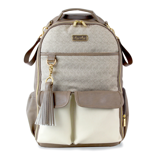 a backpack with a tassel hanging from it