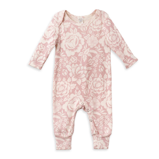 a baby girl's pink and white floral footie