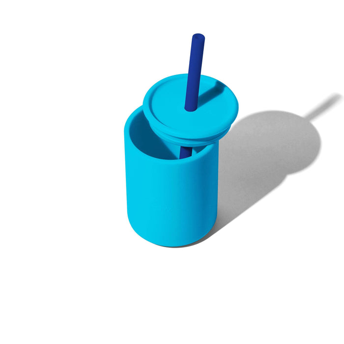 a blue baby sippy cup with a straw sticking out of it