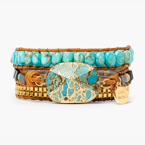 a stack of bracelets with turquoise and gold beads