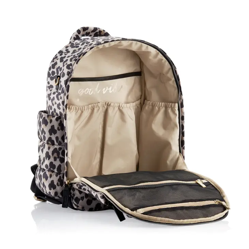 a leopard print backpack with a leopard print back pack